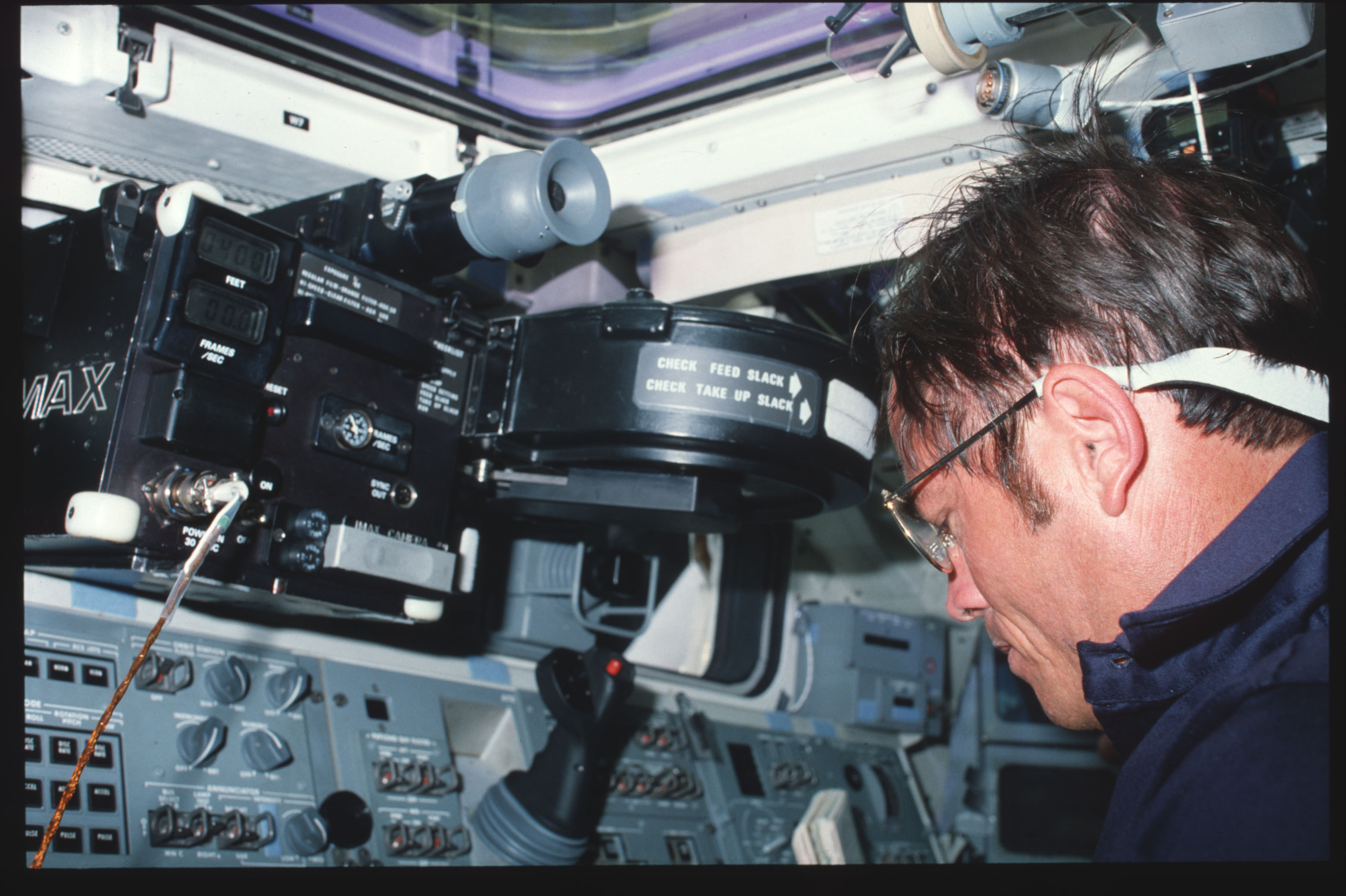 File:41C-02-062 - STS-41C - Candid views of STS 41-C crewmembers