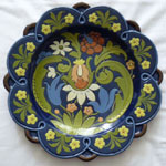12" Plaque decorated in Art Nouveau style with a seed-head, tendrils and flowers ArtNouveauPlaque1.jpg