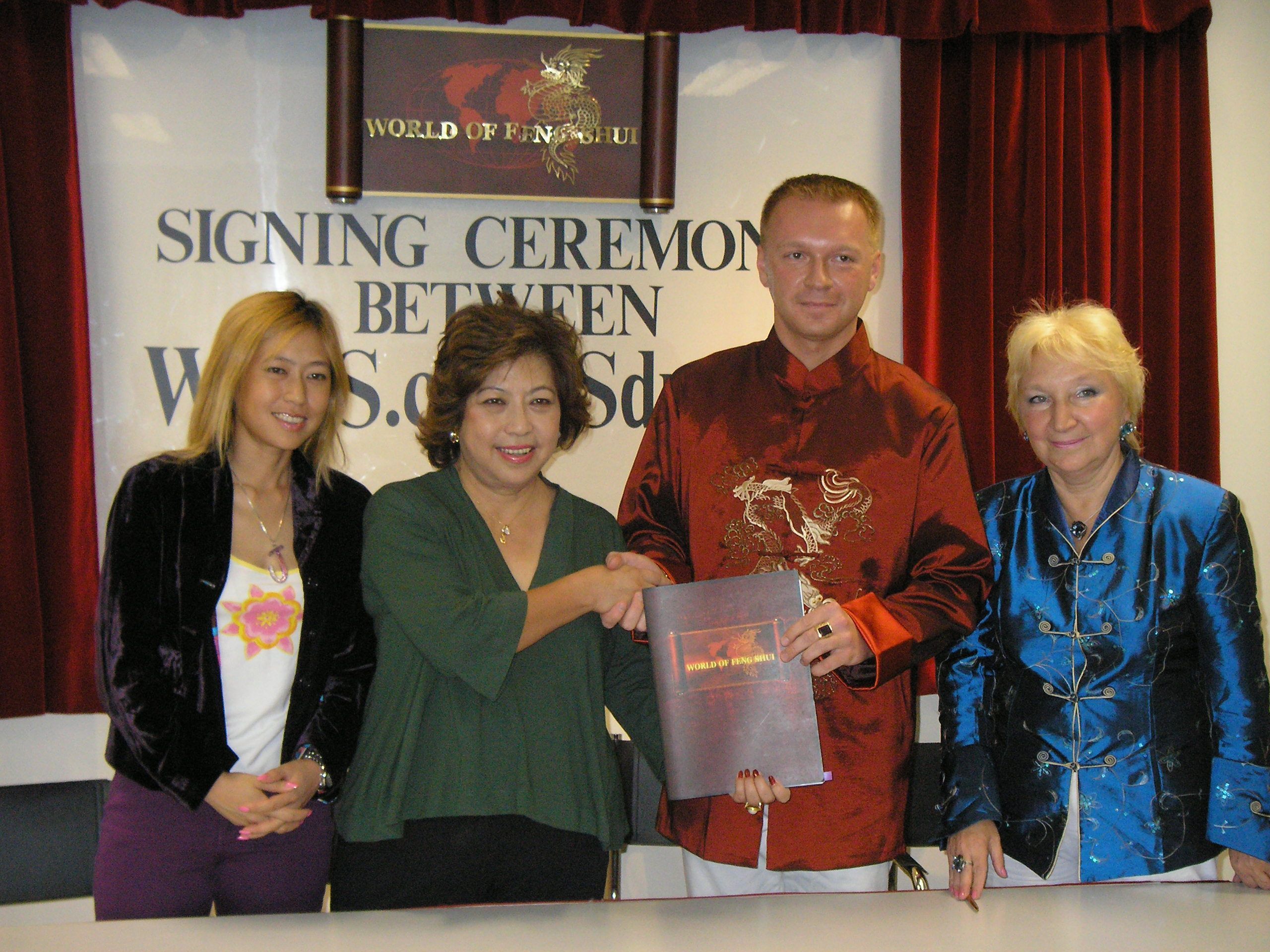 Lillian Too (second from left, in green blouse)