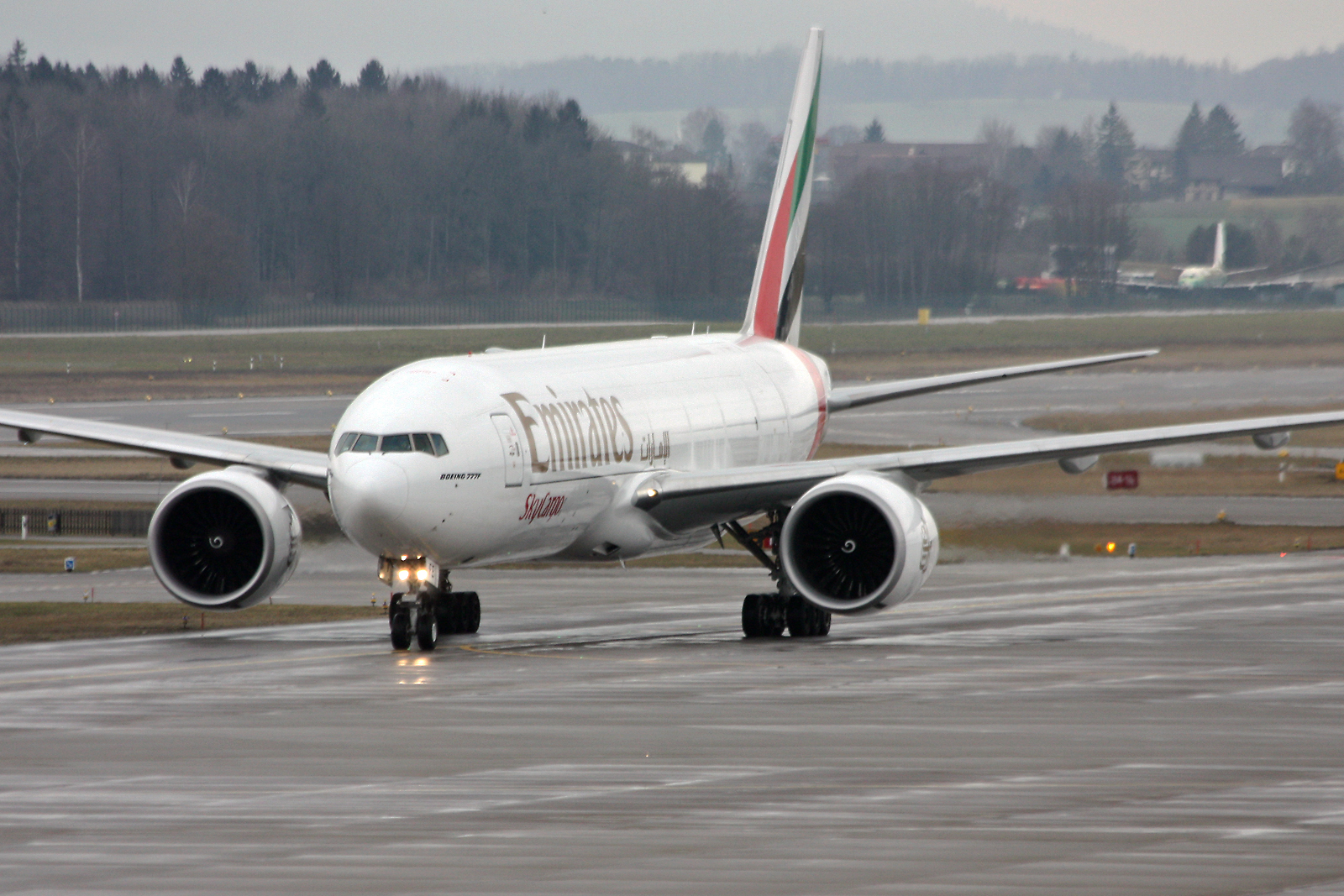 Emirates SkyCargo Boeing 777-F1H A6-EFE (23238100772).jpg Zürich (- Kloten) (ZRH / LSZH) Switzerland 1.2012 Date 25 January 2012, 11:24 Source Emirates SkyCargo