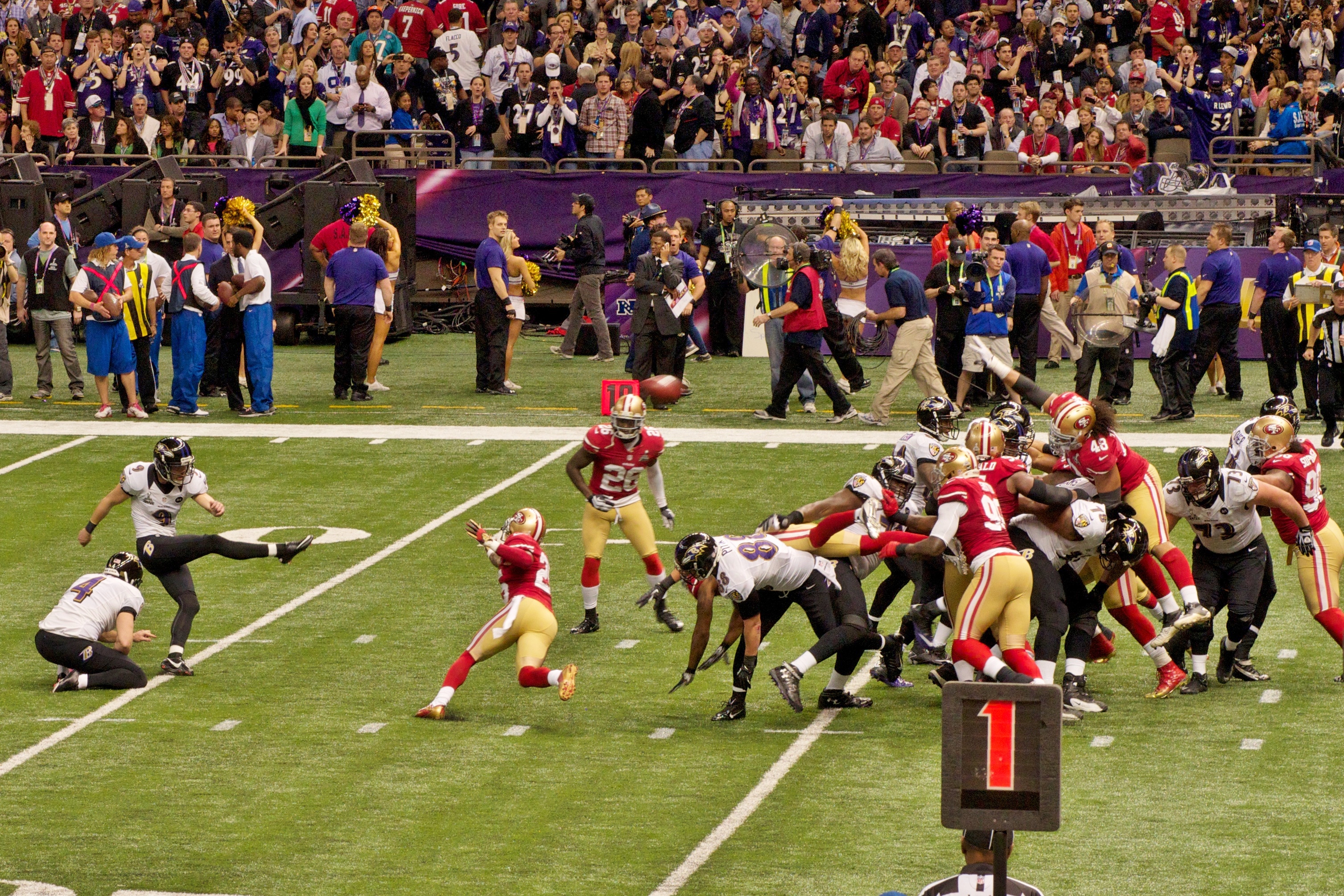 Levi's Stadium turf slides under Ravens kicker Justin Tucker's plant foot