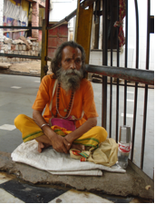 A mendicant outside ‘Kalkaji Mandir’  in Delhi, India