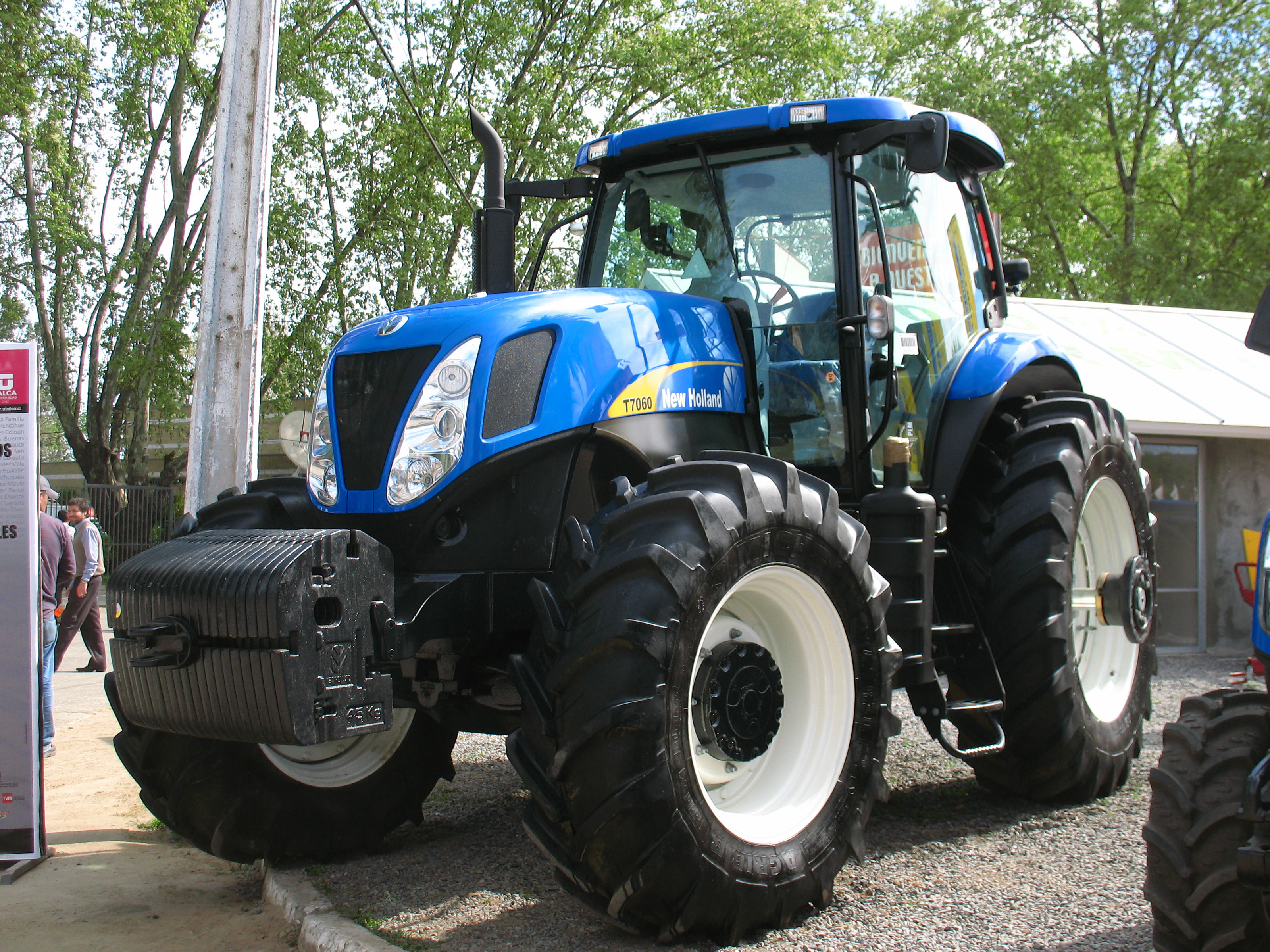 New holland t. New Holland t7060. New Holland трактор 7060. Трактор New Holland t6070. Трактор Нью Холланд т9030.