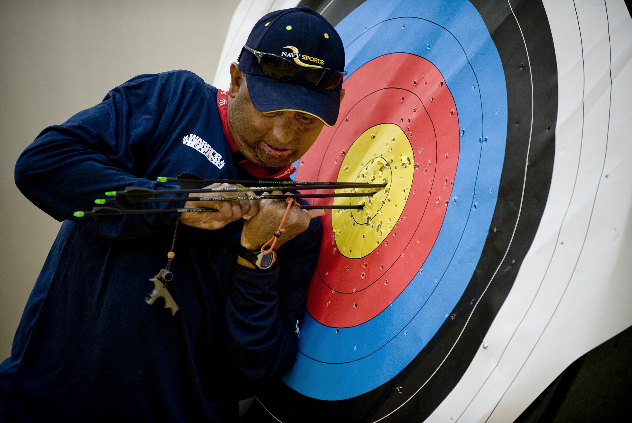 FileUS Navy 100511-N-6932B-157 Chief Electricians Mate Peter Allen Johns retrieves his arrows while practicing for the archery competition at the inaugural Warrior Games in Colorado Springs, Colo.jpg