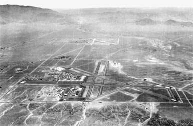 Kirtland Army Air Base (now Kirtland Air Force Base) is seen in the foreground of this 1945 photograph. Looking east, Sandia Base is in the background. Sb-aerial-1945.jpg