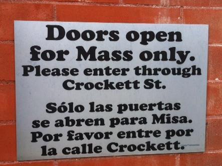File:Bilingual sign at Dallas Cathedral.JPG