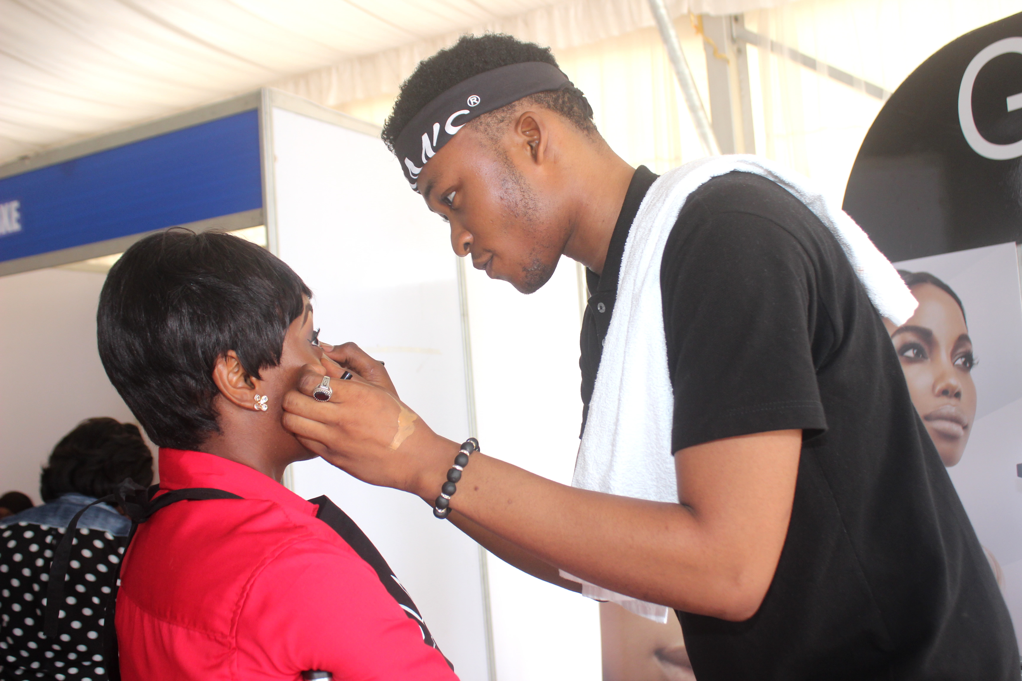 Male Makeup tehnician.jpg English: A Ghanaian male Makeup Artist serving his female customer Date 2 November 2017, 16:06:43 Source Own work