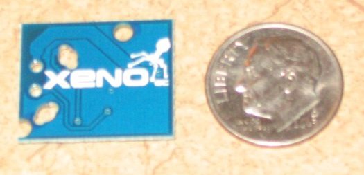 File:XenoGC modchip back with coin.jpg