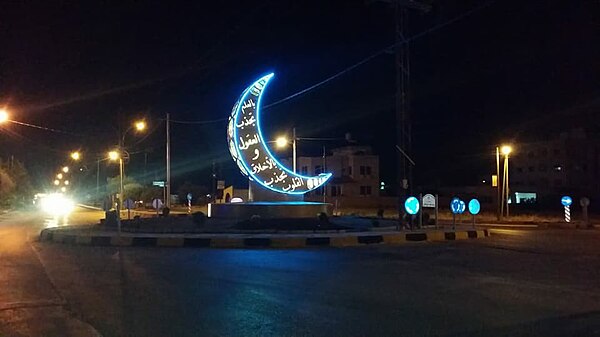 Crescent depicted in the shape of a lighted sign