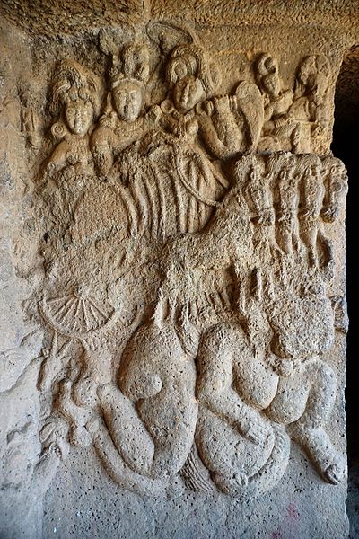 Surya on his charriot with horses, Bhaja Caves (1st cent BCE).