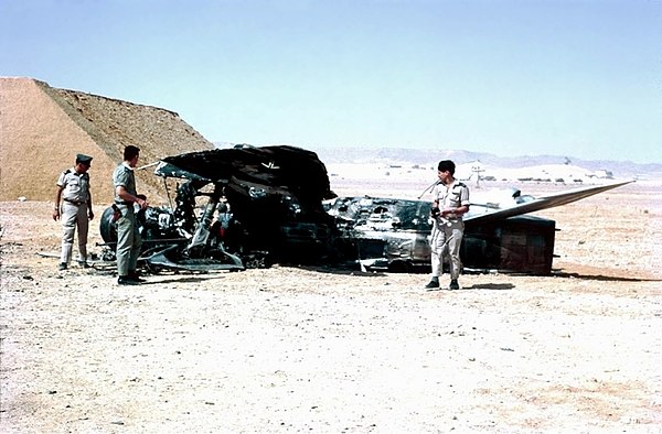 Israeli troops examine destroyed Egyptian aircraft