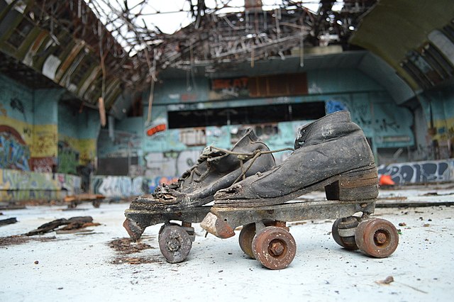 Abandoned roller skates and graffiti at the burned-out Skate Arena, 2014
