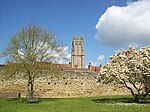 Glastonbury Abbey Precinct Wall from No.2 Silver Street to Abbey Gatehouse Abbet grounds, tower of St. John's church in background.jpg