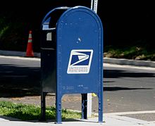 This (replacement) mailbox is identical to the one, and in the same location that convicted spy Aldrich Ames used to signal his Russian counterparts. Ames would place a horizontal chalk mark about 3" long above the USPS logo. Aldrich Ames mailbox.jpg