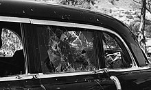 The laminated glass in Vice President Richard Nixon's vehicle was nearly breached by a hostile crowd in Caracas in 1958 An automobile that has sustained damage following a mob attack in Caracas, Venezuela, targeting Vice President Richard Nixon. Close-up of shattered windows.jpg