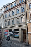 Apartment building with a modern shop area, in a closed area