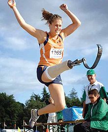 Annette Roozen competing in the long jump with her prosthetic leg. AnnetteLongJump.jpg