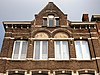 Vastgoedcomplex met winkel- en burgerhuizen