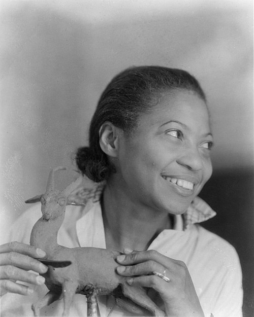 Augusta Savage with her famous sculptures.