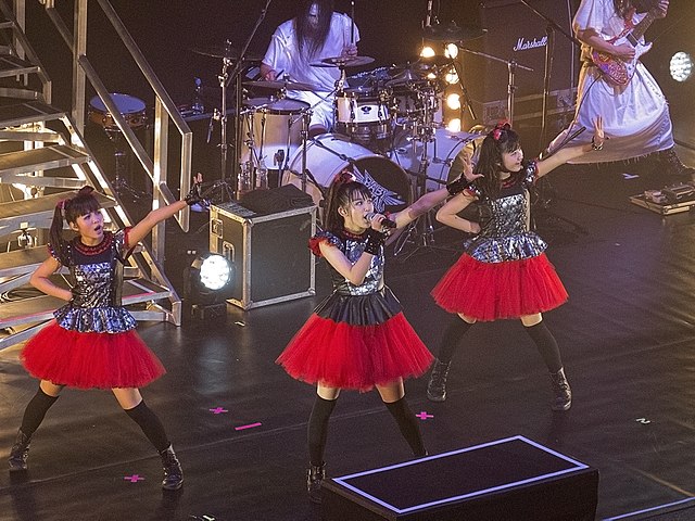 Babymetal performing in London, November 2014. From left to right; Moametal, Su-metal and Yuimetal