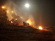 Cremations in progress at Manikarnika Ghat, Varanasi. Burning ghats of Manikarnika, Varanasi.jpg