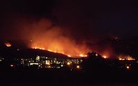 The Cocos Fire burning above CSU San Marcos, on May 14, 2014 Cocos fire - part of May 2014 San Diego County wildfires.jpg