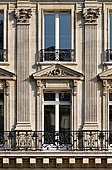 Colossal order of Composite pilasters. 1st and 2nd floors of a 19th-century building, 8 avenue de l'Opéra (Paris)