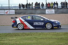 Geddie driving the United Autosports Toyota Avensis at Donington Park during the 2014 British Touring Car Championship season. DSC 0141 (13253815465).jpg