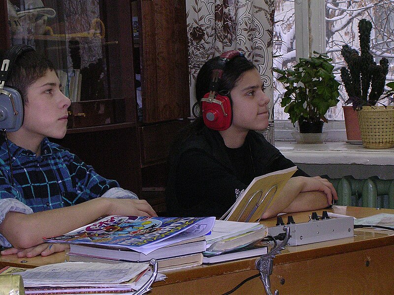 File:Deaf pupils with headphones.jpg