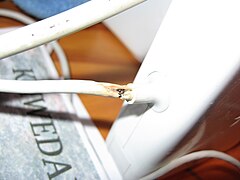 MagSafe with both frayed wires and melted casing, as alleged in the 2009 class action lawsuit