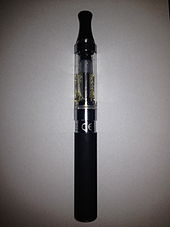 eGo style e-cigarette with a top-coil clearomizer. Silica fibers are hanging down freely inside of the tank, drawing e-liquid by capillary action to the coil that is located directly under the mouthpiece.