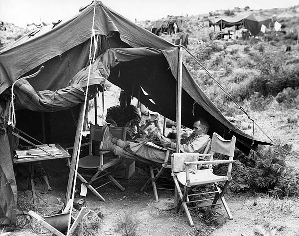 Colonel Edward W. Snedeker, deputy chief of staff, 1st Marine Division, at his command post in Korea.