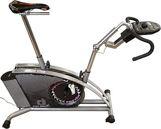 Stationary bicycle device with saddle, pedals, and some form of handlebars arranged as on a bicycle, but used as exercise equipment rather than transportation.