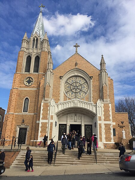 File:Front view St Adalbert Church Elmhurst Queens NY Priests and Parishioners.JPG