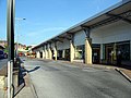 The view west along the eastbound lane of the southern half of the bus station - on the left is the end of the Opening Line sculpture 2 June 2009