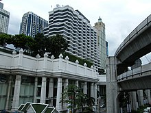 The 22-storey hotel building rises above the podium. Grand Hyatt Bangkok Ratchadamri.jpg