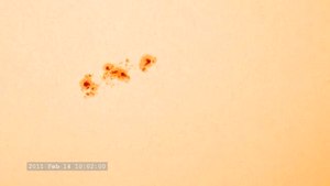 File:Growing Sunspots Tracking Closeup - February 2011.ogv