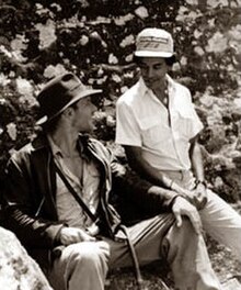 Ford with production manager Chandran Rutnam on the set of Indiana Jones and the Temple of Doom in Kandy, Sri Lanka, 1983