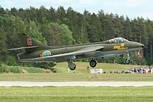 J34 Hawker Hunter, civ reg SE-DXM (former Swiss Air Force J-4082) Hawker Hunter F58 34033 G red (SE-DXM) (8389885443).jpg