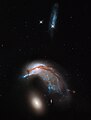 Arp 142 (NGC 2936, NGC 2937)