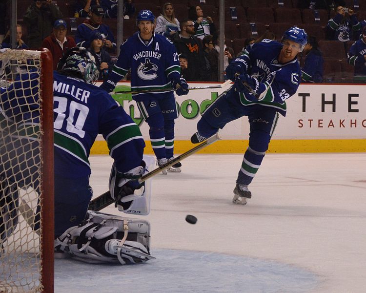 File:Henrik Sedin shoots Ryan Miller.JPG