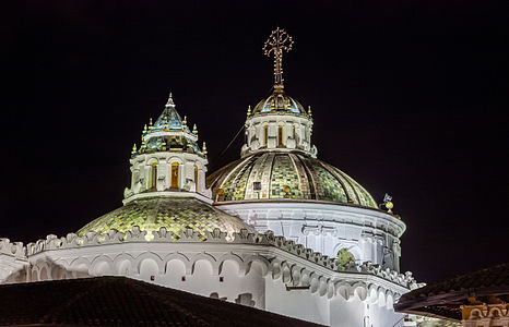 Night view of the exterior of the domes of the Church of the Society of Jesus (La Iglesia de la Compañía de Jesús), a Jesuit church in Quito, Ecuador.