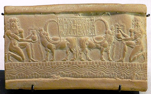 Impression of a cylinder seal of the time of Akkadian King Sharkalisharri, with central inscription: 𒀭𒊬𒂵𒉌 𒈗𒌷 𒁕𒈝 𒈗 𒀀𒂵𒉈𒆠 𒅁𒉌𒈗 𒁾𒊬 𒀵𒋢 DShar-kali-sharri da-