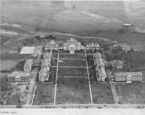 Aerial view of campus from 1937, showing the original campus plan, prior to major expansions of the campus.