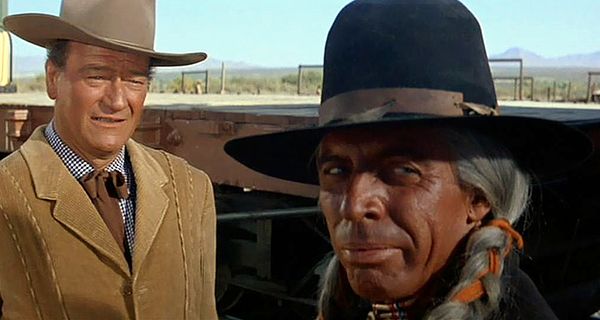 John Wayne and Michael Pate as G.W. McLintock and Comanche Chief Puma (Pate is in redface).