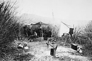 First camp of the second John Wesley Powell expedition, in the willows, Green River, Wyoming, 1871. There were no photographs taken on the 1869 expedition. John powell camp.jpg