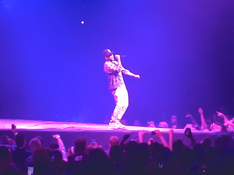 Lamar performing "Money Trees" during the Yeezus Tour