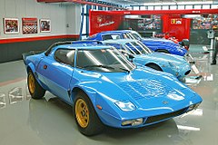 The Lancia Stratos HF was powered by a mid-transverse mounted Dino Ferrari V6, and proved to be very successful as a rally car.