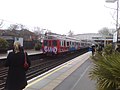 London Underground D78 Stock with Graffiti at Kew Gardens Station.jpg