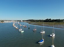 The river at its mouth, looking northwest towards the town of Lymington